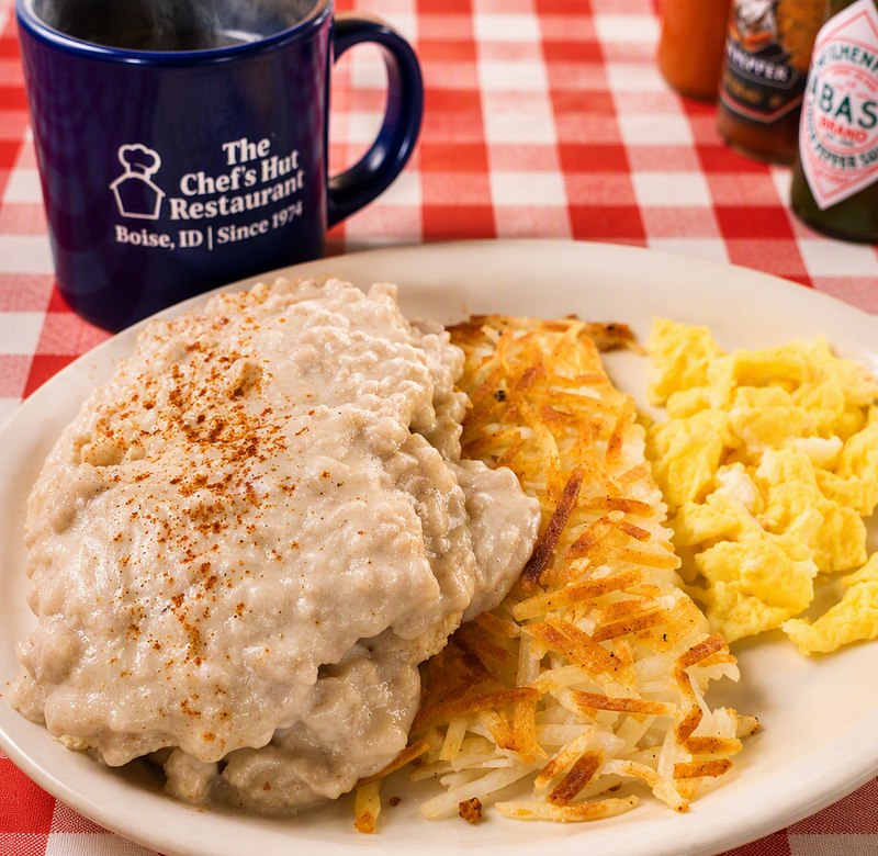 Biscuits and gravy with breakfast sides